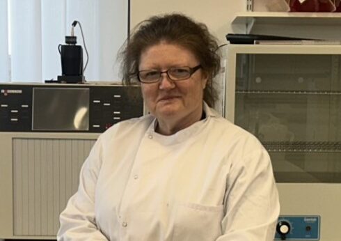 Kate Herbert standing in a lab