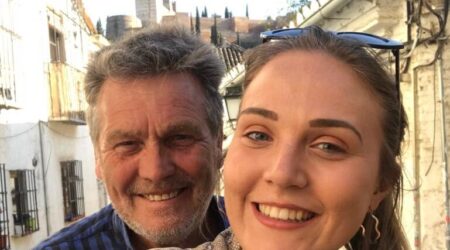 Man and daughter selfie picture smiling to camera